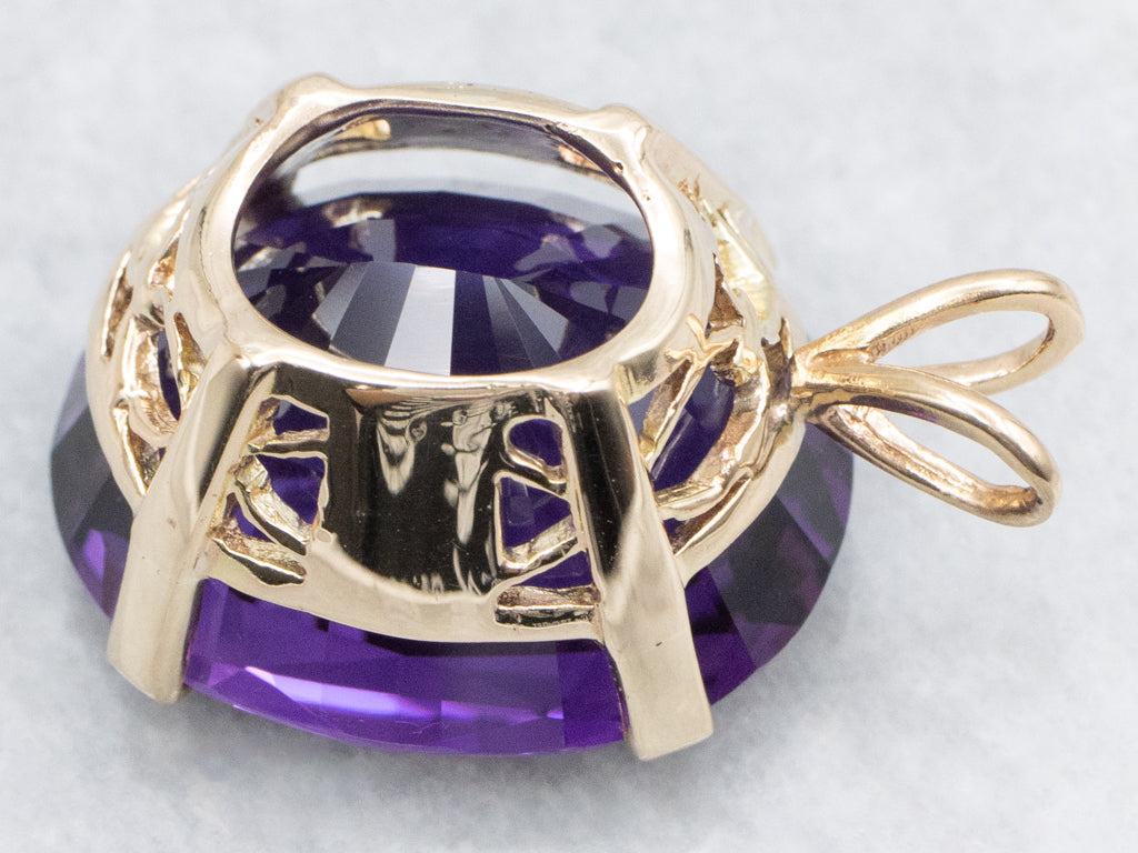 Four-Prong Oval-Cut Amethyst and Gold Cocktail Pendant