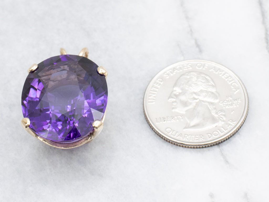 Four-Prong Oval-Cut Amethyst and Gold Cocktail Pendant