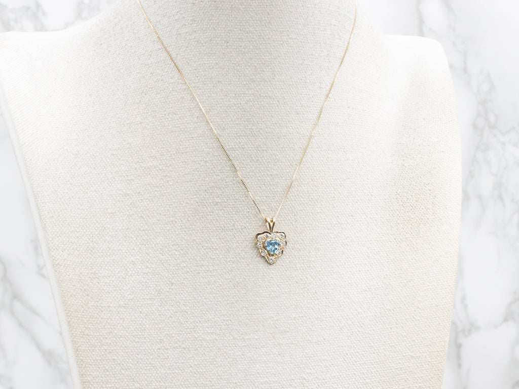 Trillion-Cut Topaz and Scalloped Gold Diamond Halo Pendant