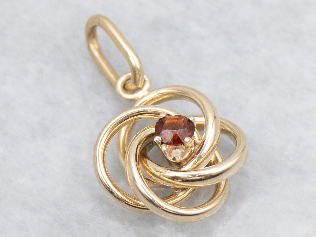 Yellow Gold Garnet Lovers Knot Pendant