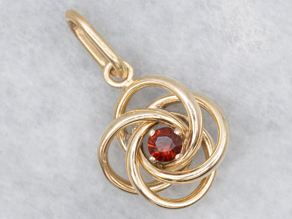 Yellow Gold Garnet Lovers Knot Pendant
