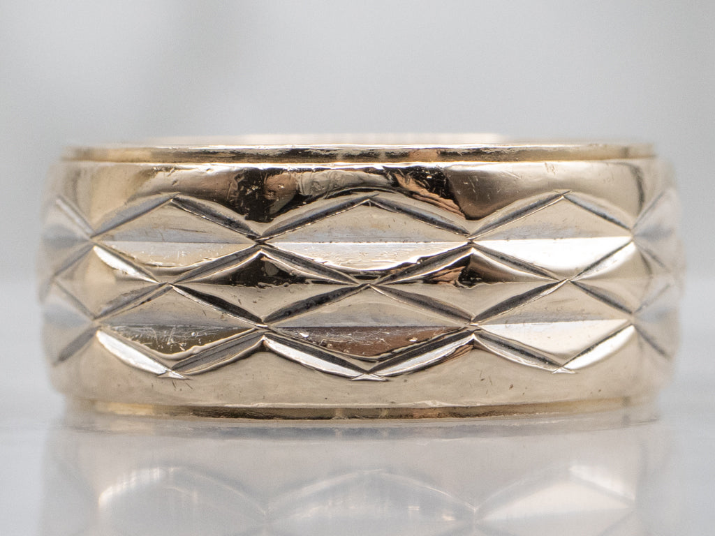 Wide Yellow Gold Band with Faceted Center
