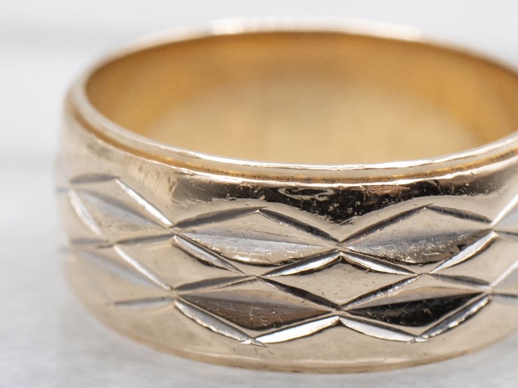 Wide Yellow Gold Band with Faceted Center