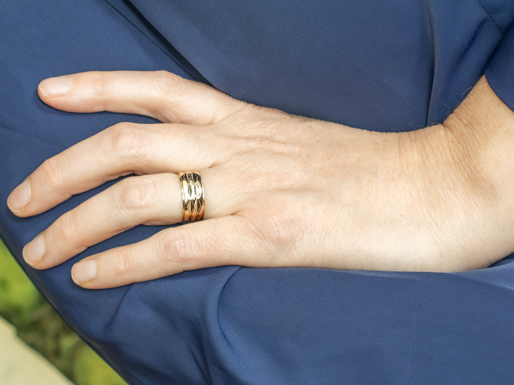 Wide Yellow Gold Band with Faceted Center