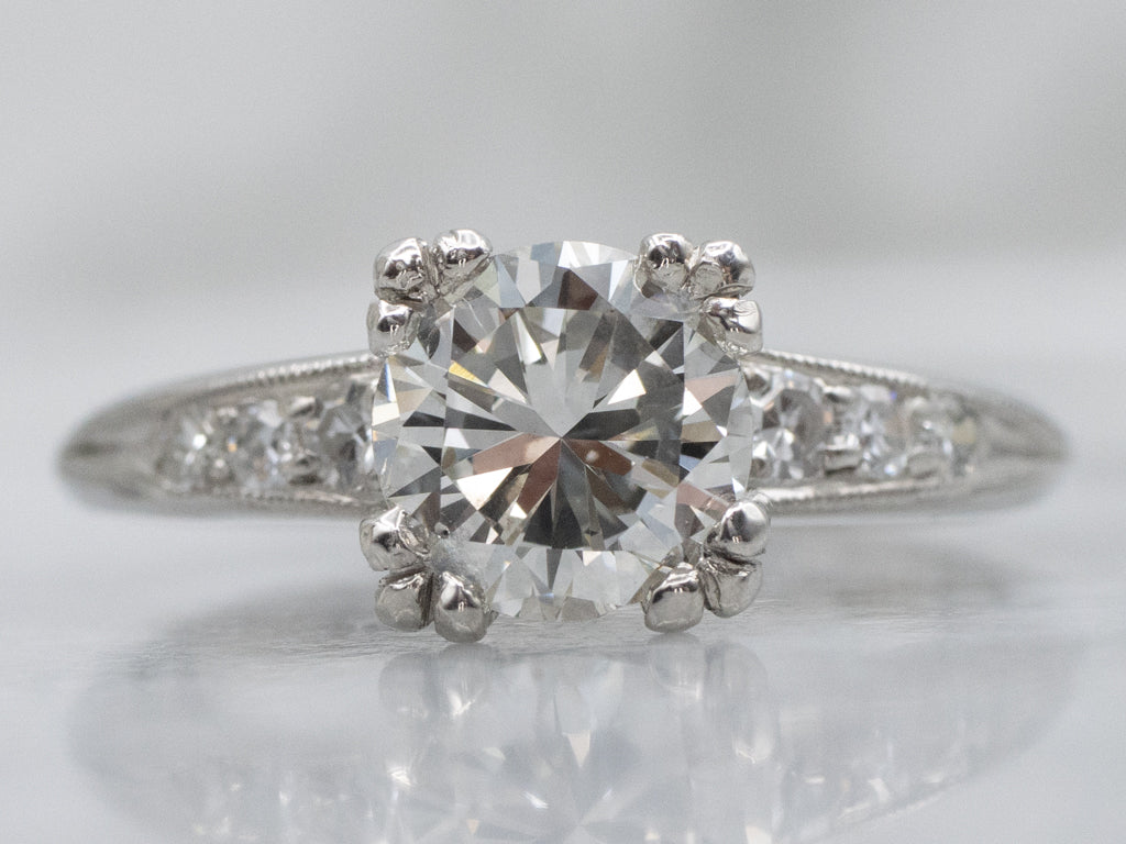 Retro Era Platinum and Diamond Engagement Ring with Fishtail Prongs