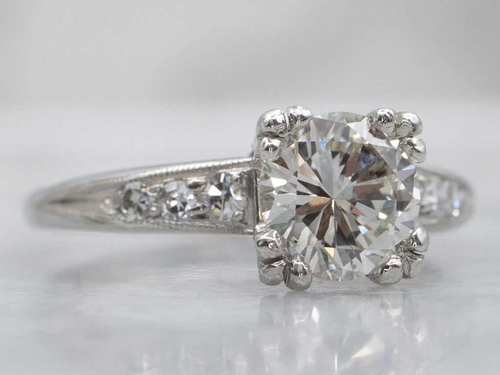 Retro Era Platinum and Diamond Engagement Ring with Fishtail Prongs