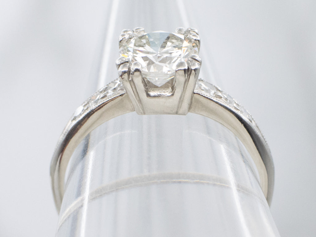 Retro Era Platinum and Diamond Engagement Ring with Fishtail Prongs