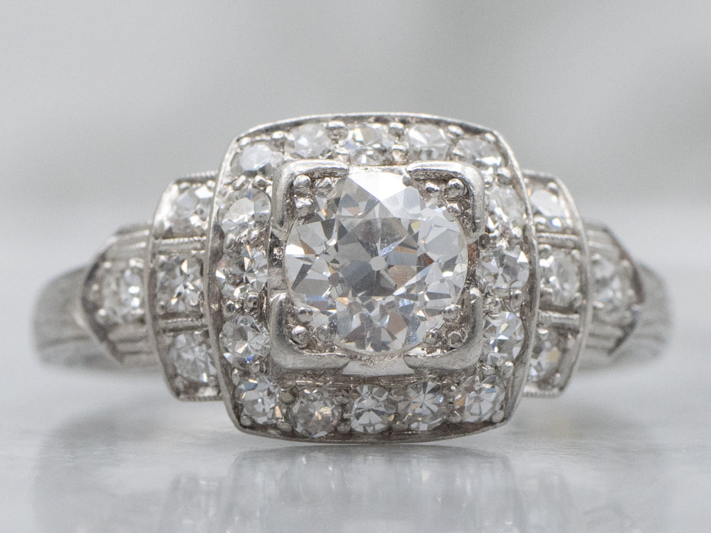 Antique Platinum Old Mine Cut Diamond and Diamond Halo Ring
