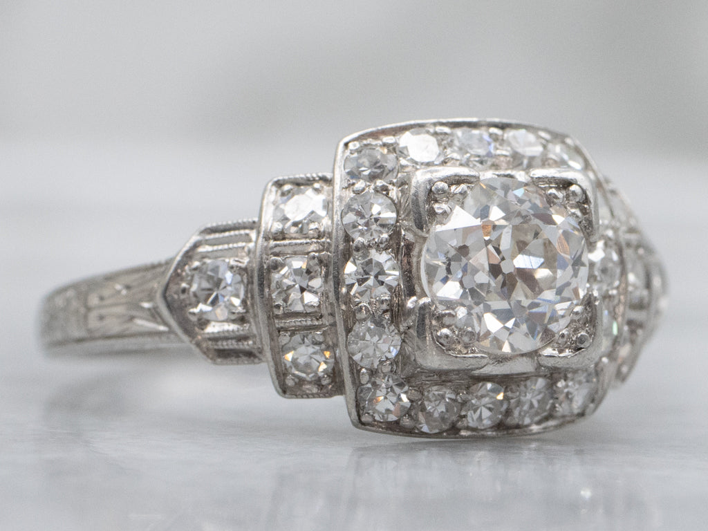 Antique Platinum Old Mine Cut Diamond and Diamond Halo Ring