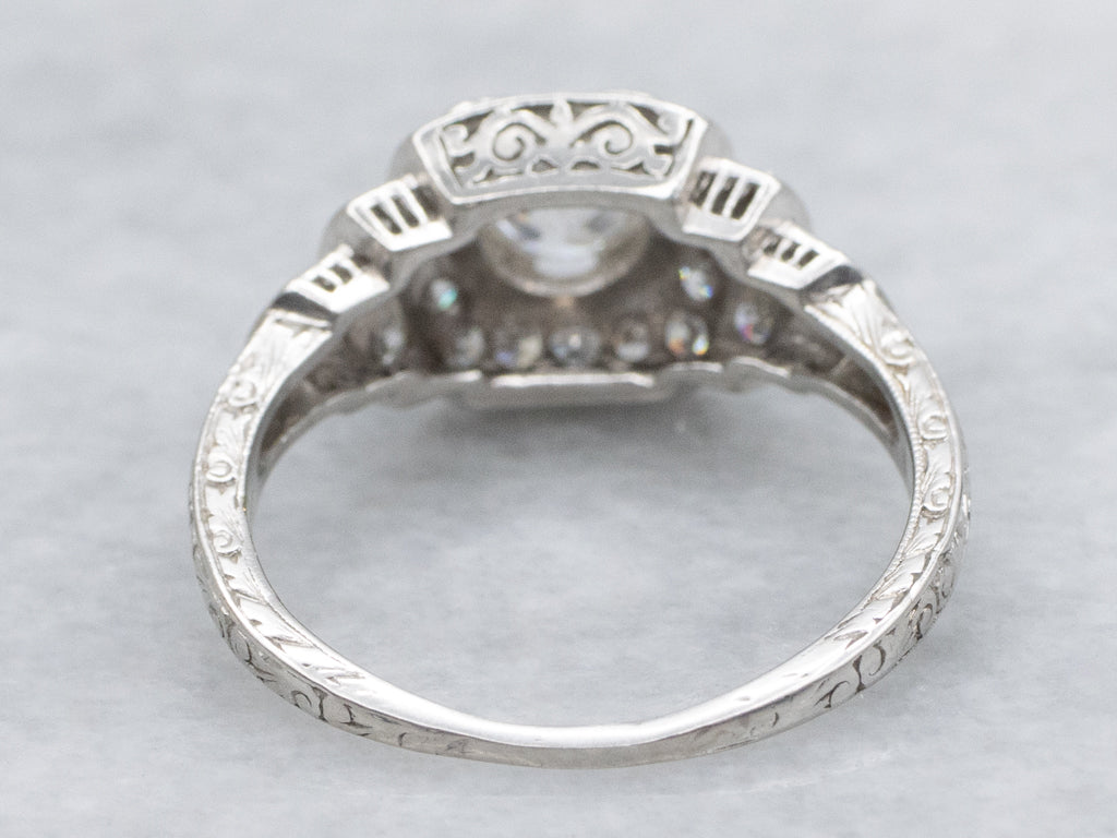 Antique Platinum Old Mine Cut Diamond and Diamond Halo Ring