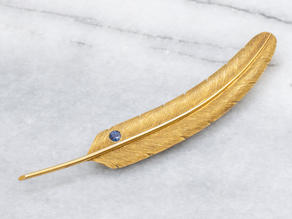 Detailed Yellow Gold Feather Pin with Blue Sapphire