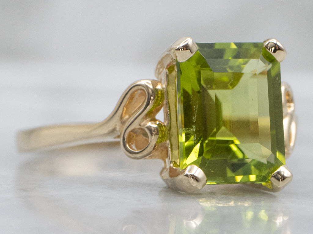 Emerald-Cut Peridot and Gold Solitaire Ring