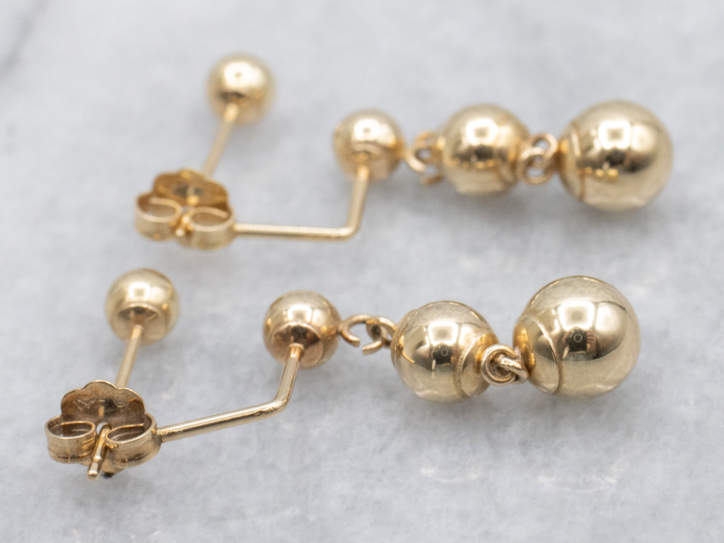Polished Ball Yellow Gold Stud Earrings with Graduated Ball Drop Backs