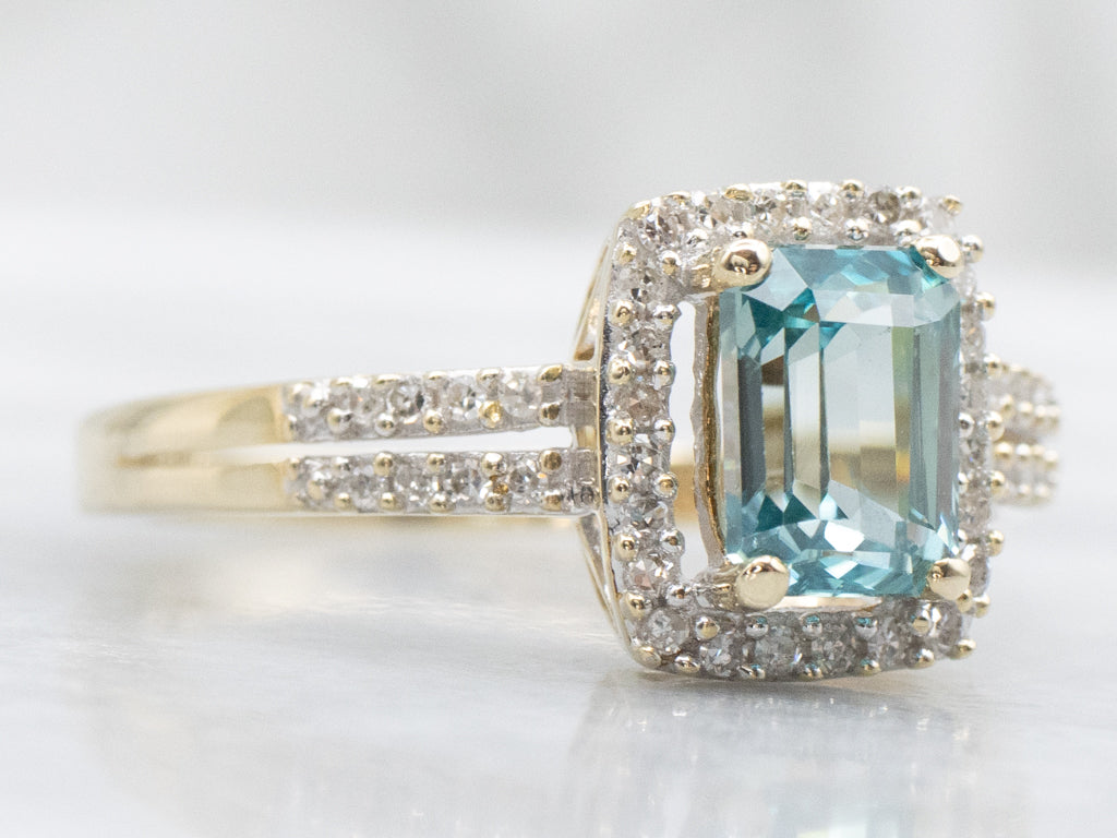 Modern Blue Zircon and Diamond Halo Ring