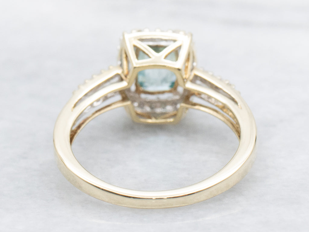 Modern Blue Zircon and Diamond Halo Ring