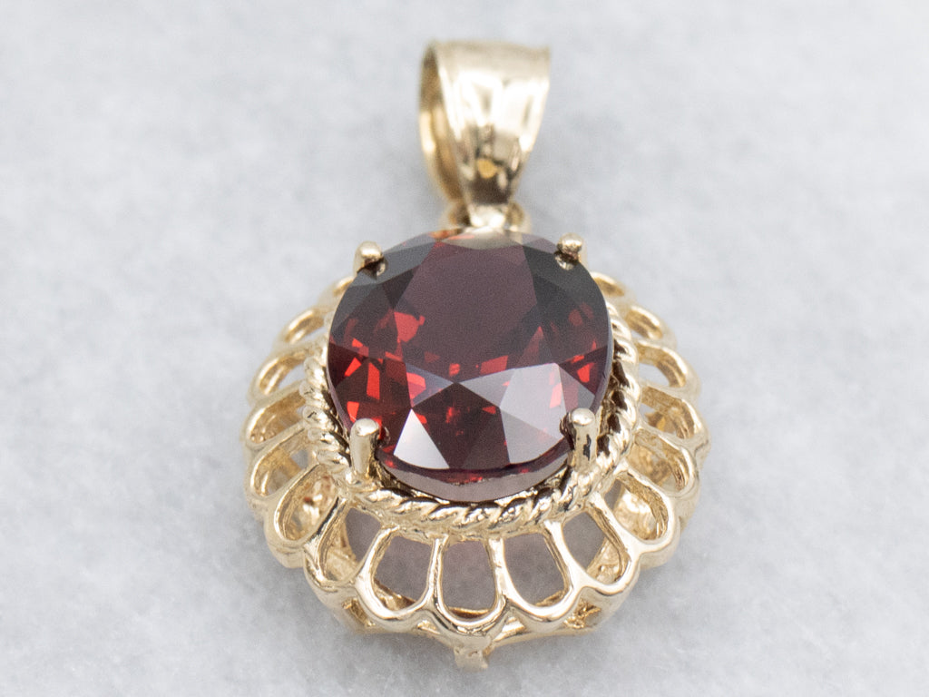 Looping Gold and Garnet Pendant with Rope Twist Details