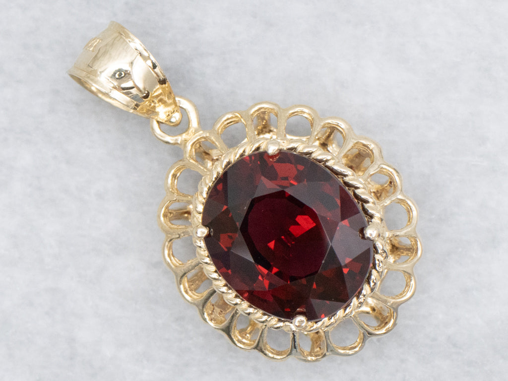 Looping Gold and Garnet Pendant with Rope Twist Details