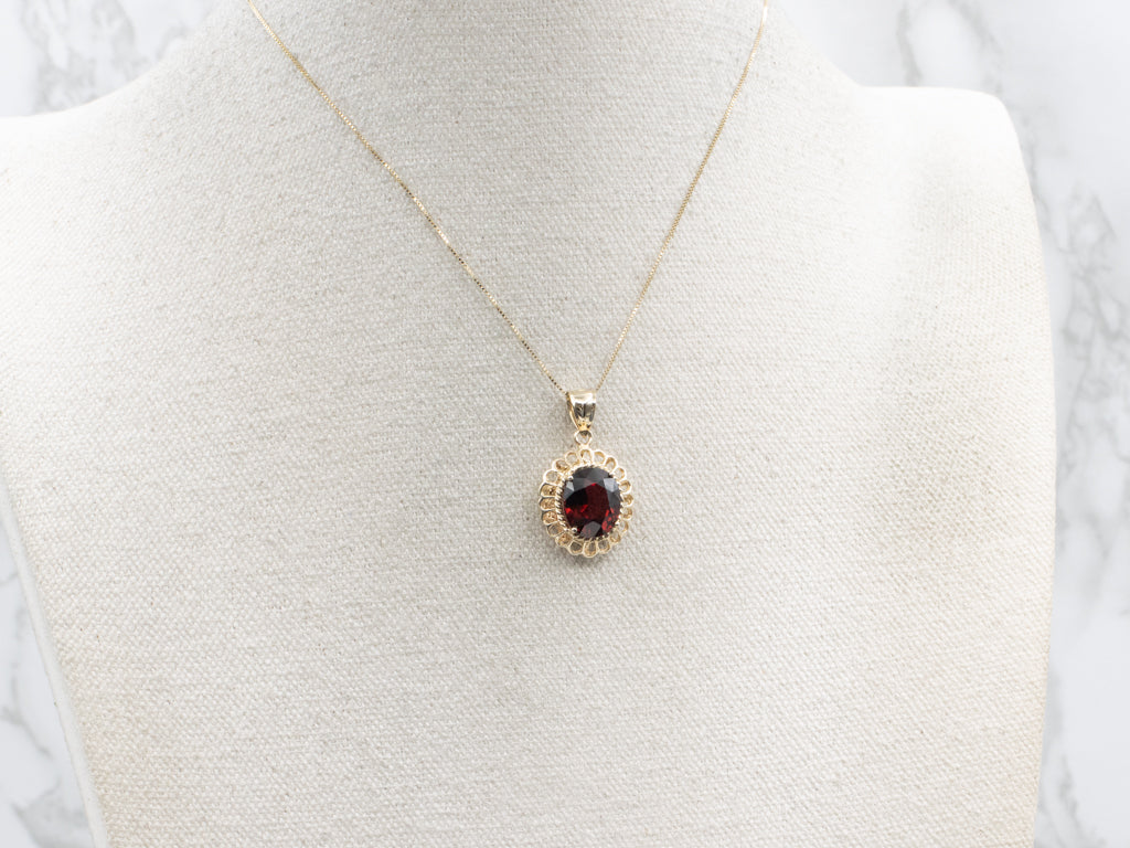 Looping Gold and Garnet Pendant with Rope Twist Details
