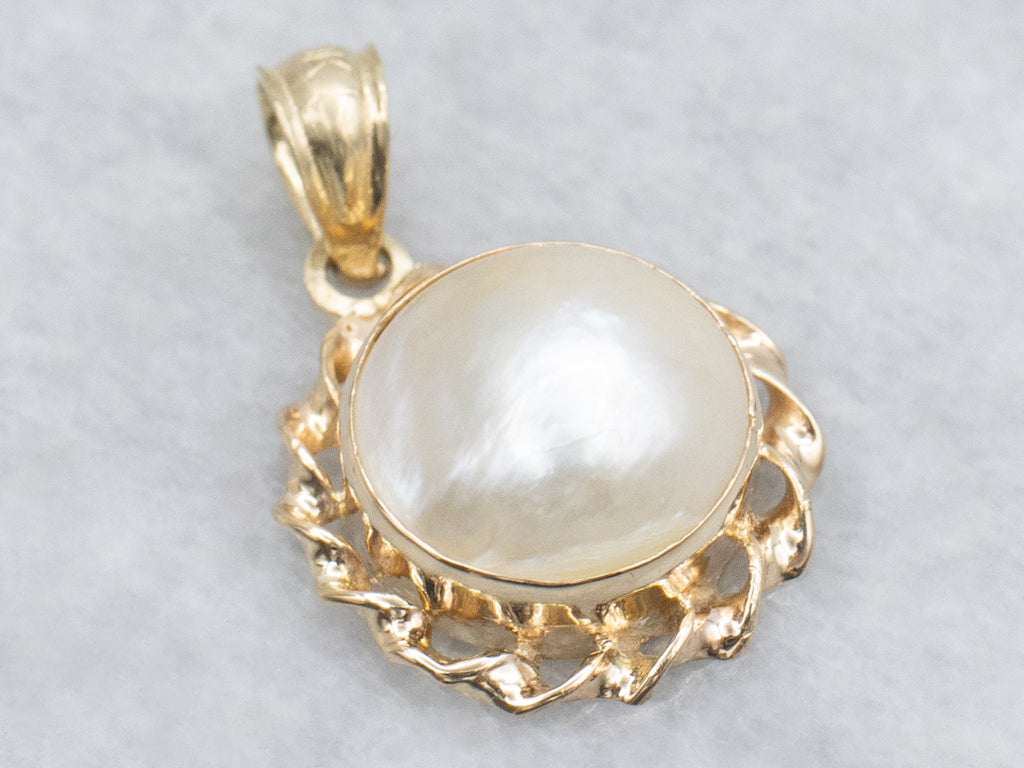 Mabe Pearl and Gold Pendant with Twisted Setting