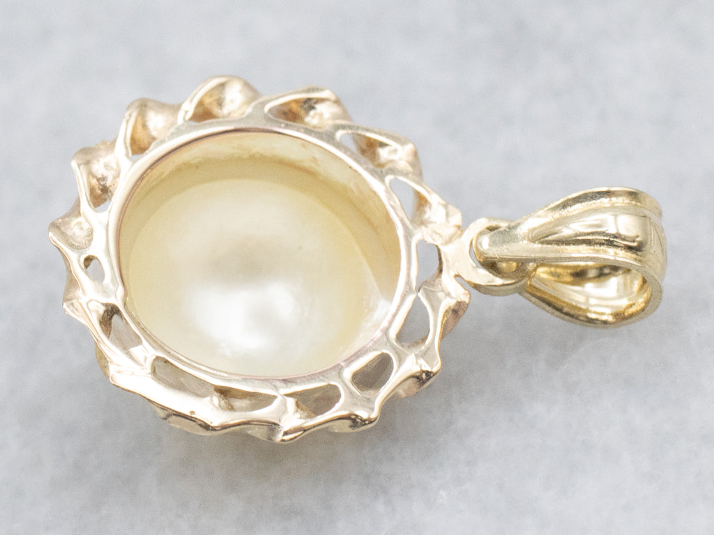 Mabe Pearl and Gold Pendant with Twisted Setting