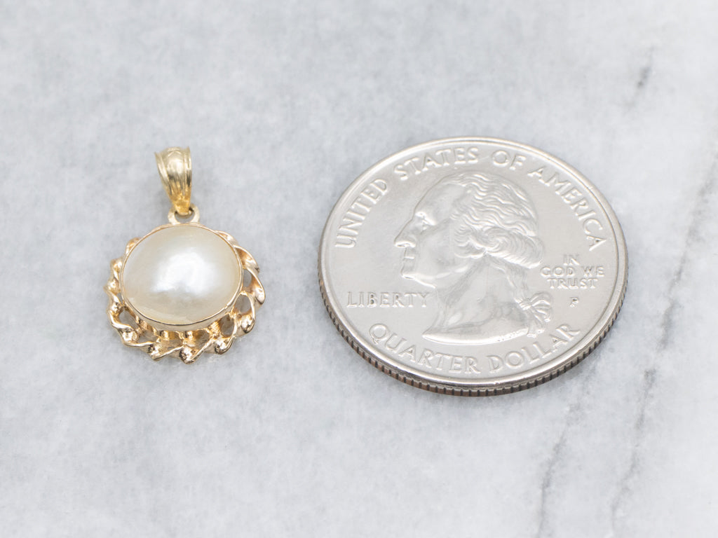 Mabe Pearl and Gold Pendant with Twisted Setting