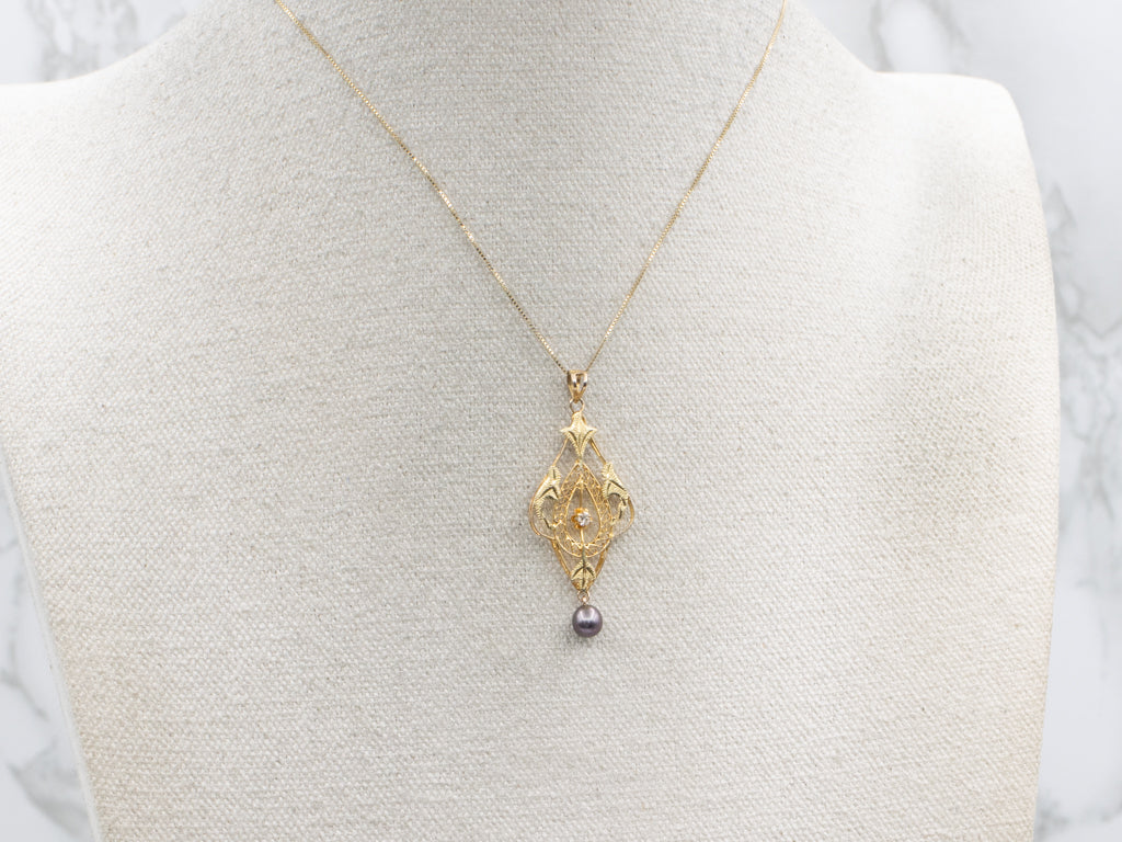 Buttercup Set Diamond and Gold Lavalier Pendant with Swinging Black Pearl