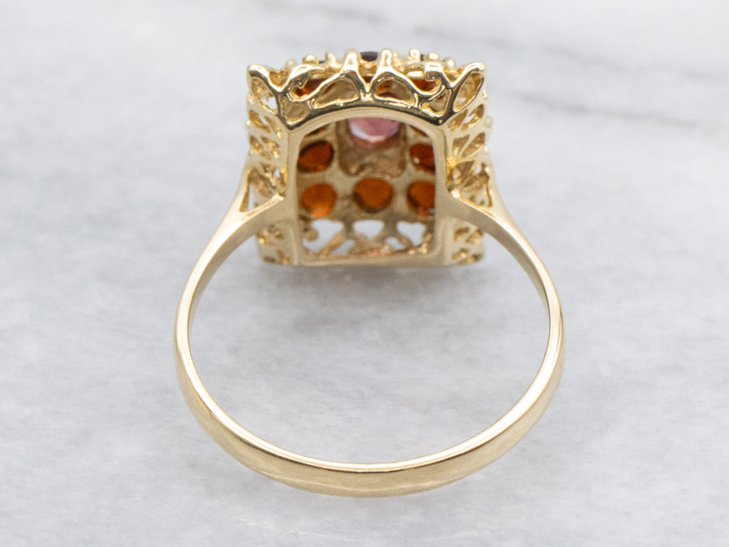 Vintage 18-Karat Gold and Garnet Halo Filigree Ring