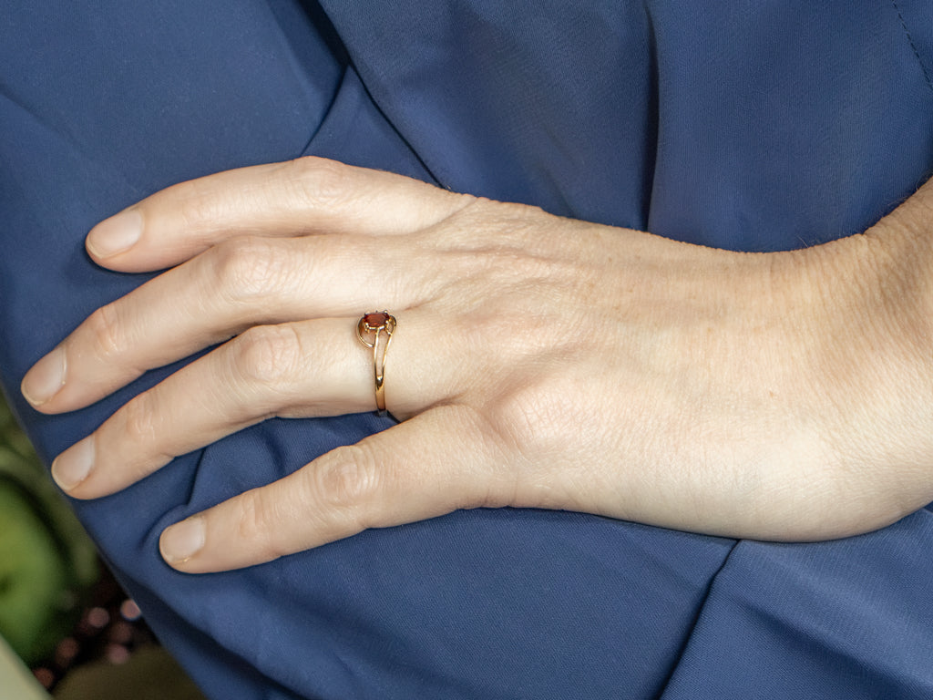 Vintage Gold and Garnet Bypass Ring with Diamond Accent