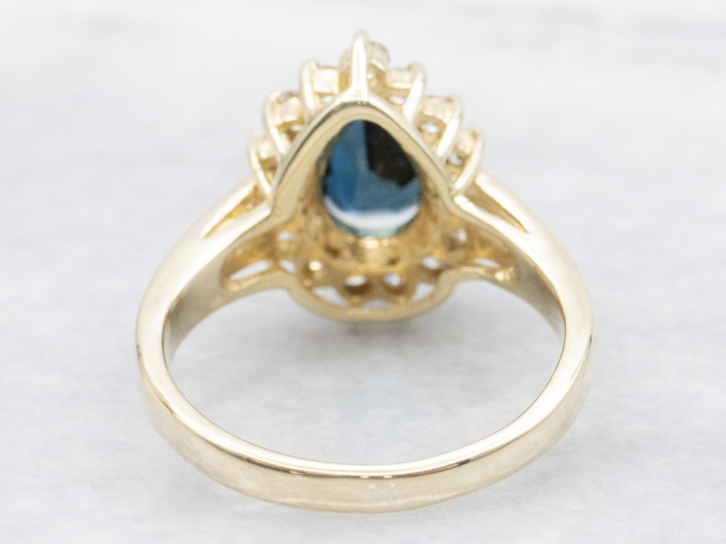 Pear-Cut Sapphire and Diamond Halo Gold Ring