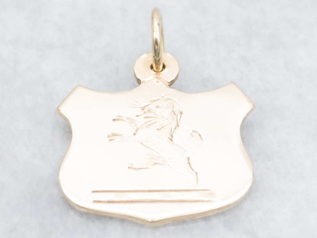 Engraved Gold Lion Shield Pendant