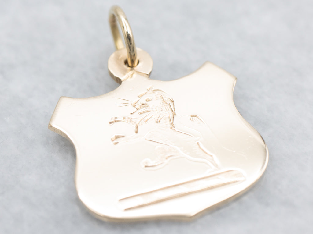 Engraved Gold Lion Shield Pendant
