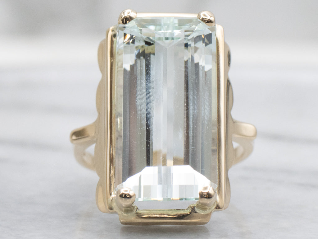 Elongated Emerald-Cut Aquamarine and Gold Cocktail Ring