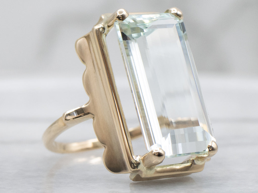 Elongated Emerald-Cut Aquamarine and Gold Cocktail Ring
