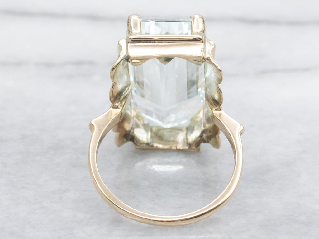 Elongated Emerald-Cut Aquamarine and Gold Cocktail Ring