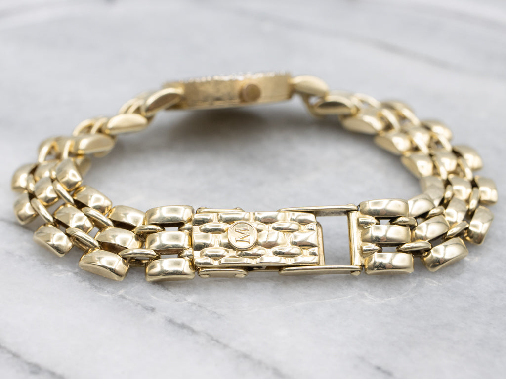 Ladies 1990s Movado Gold and Diamond Panther Link Watch