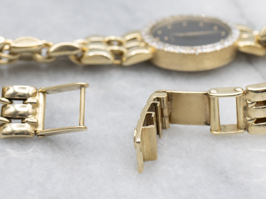 Ladies 1990s Movado Gold and Diamond Panther Link Watch