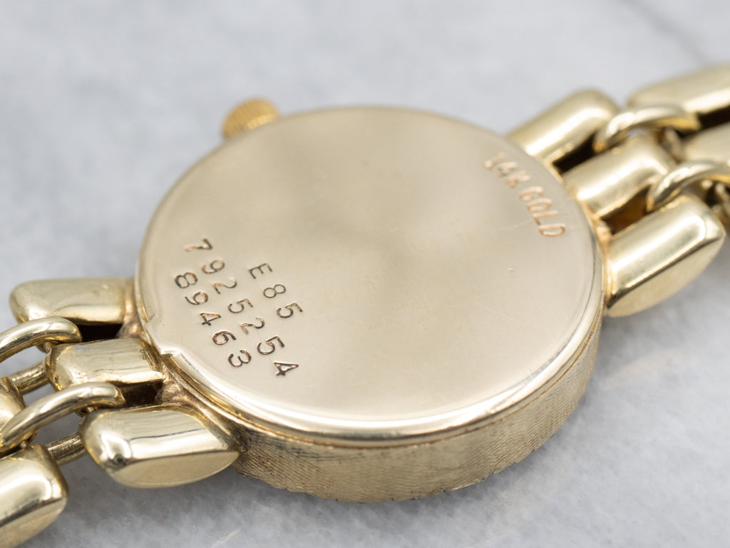 Ladies 1990s Movado Gold and Diamond Panther Link Watch