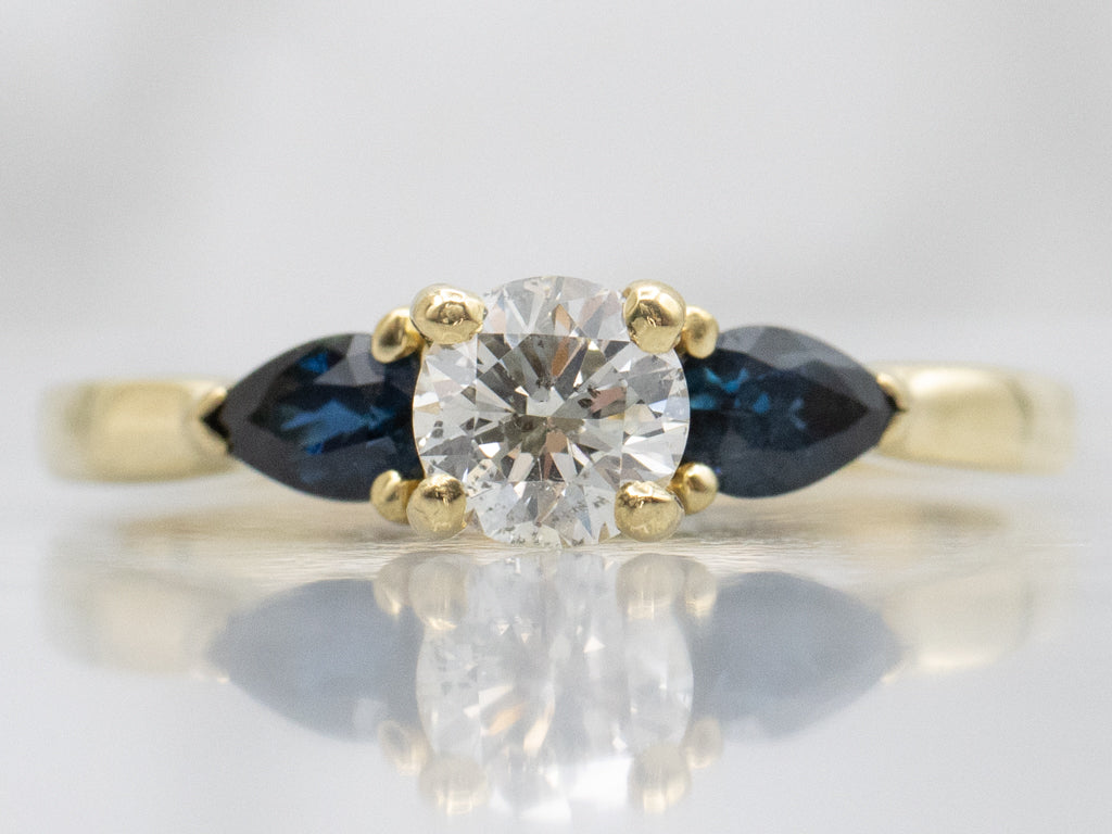 18-Karat Gold Diamond Engagement Ring with Sapphire Accents