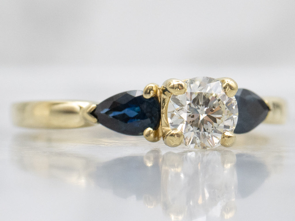 18-Karat Gold Diamond Engagement Ring with Sapphire Accents