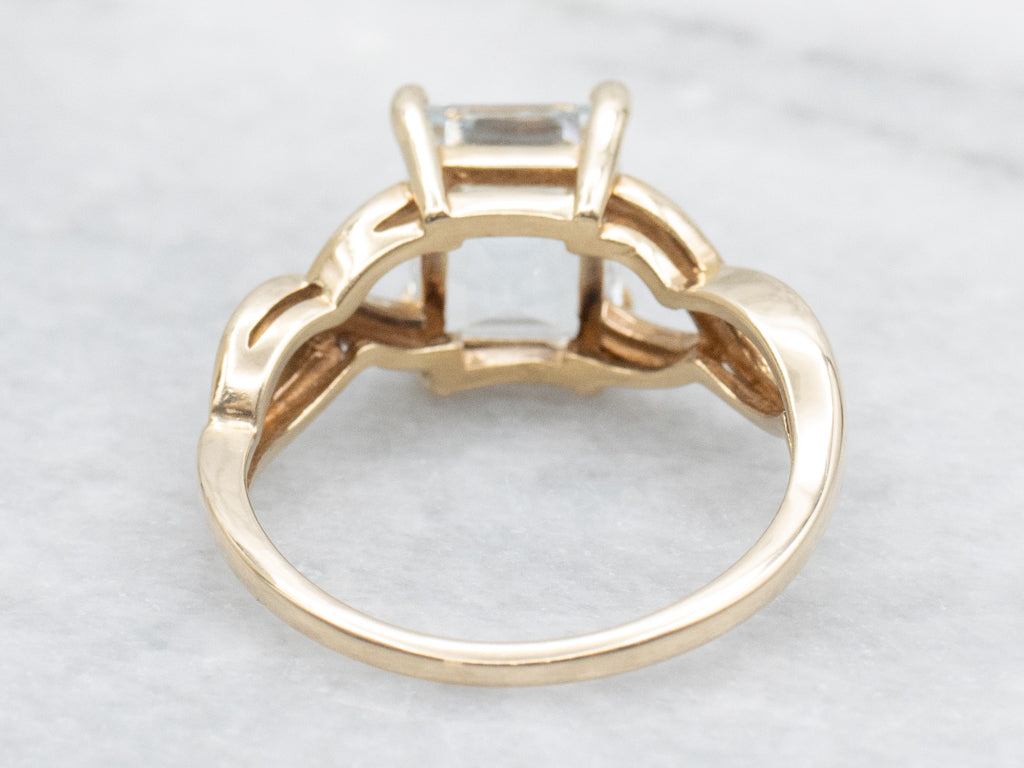 Emerald-Cut Aquamarine Gold Solitaire Ring