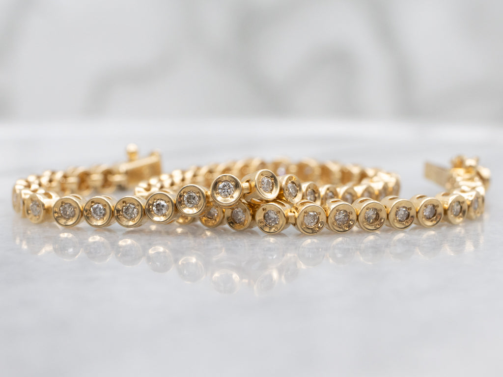 18-Karat Yellow Gold Bezel-Set Diamond Tennis Bracelet