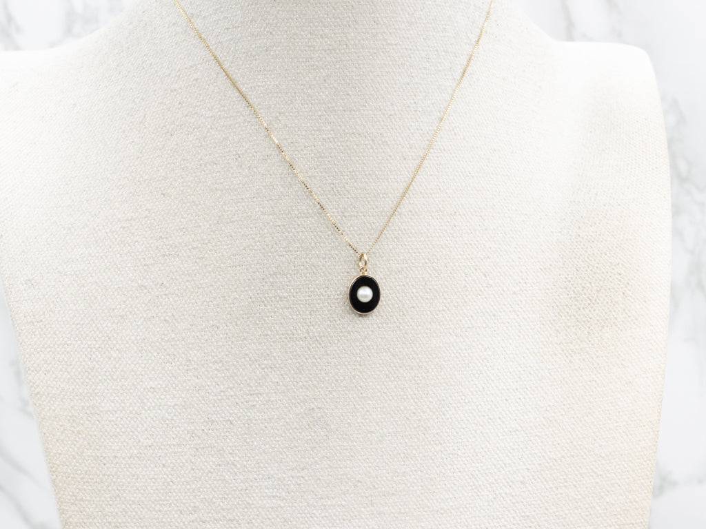 Yellow Gold Black Onyx Pendant with Pearl Center