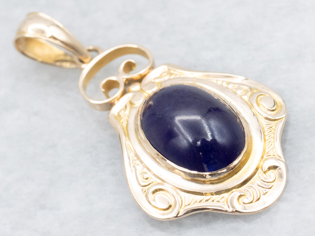 Scrolling Yellow Gold Purple Glass Cabochon Pendant