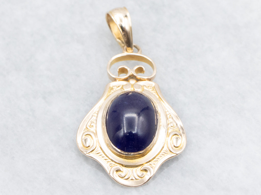 Scrolling Yellow Gold Purple Glass Cabochon Pendant