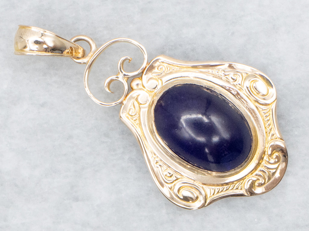 Scrolling Yellow Gold Purple Glass Cabochon Pendant