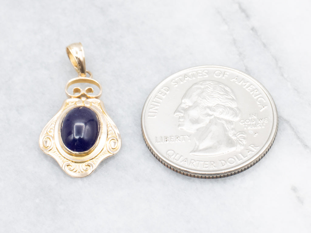 Scrolling Yellow Gold Purple Glass Cabochon Pendant