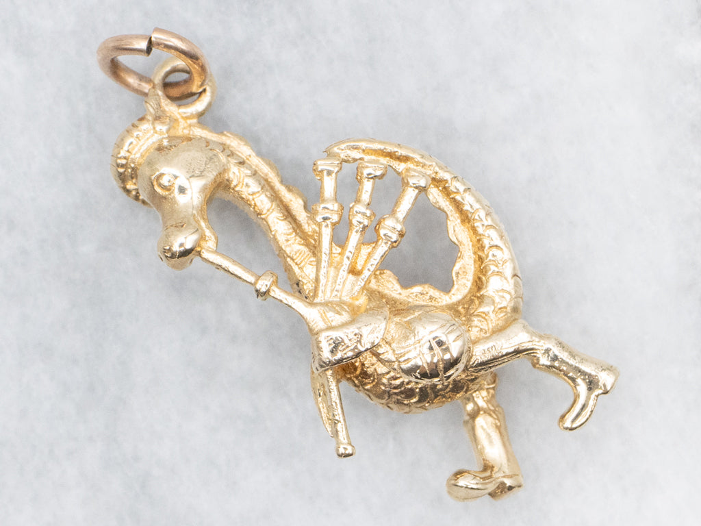 Gold Nessie Playing Bagpipes Charm