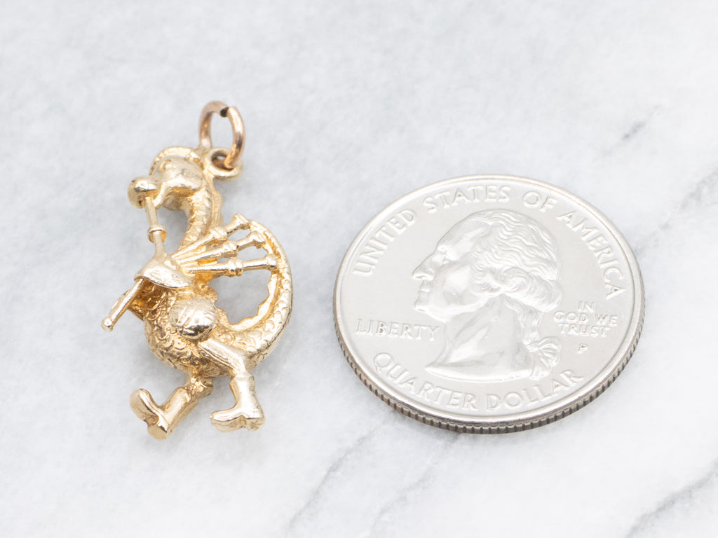 Gold Nessie Playing Bagpipes Charm