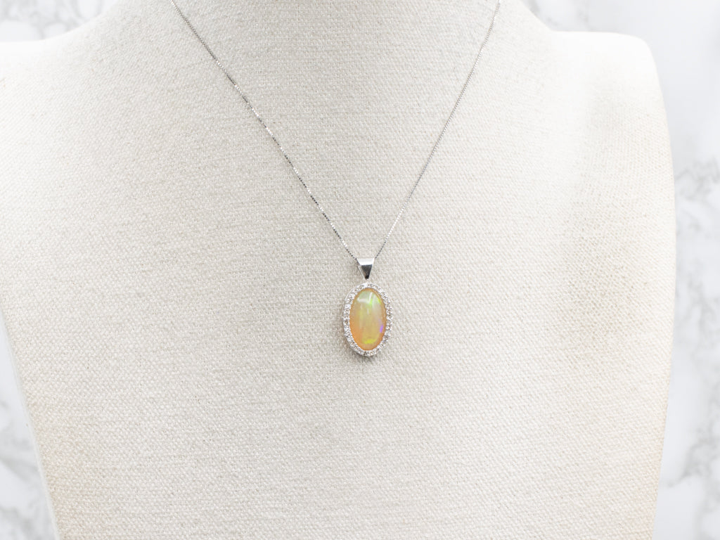 White Gold Opal and Diamond Halo Pendant