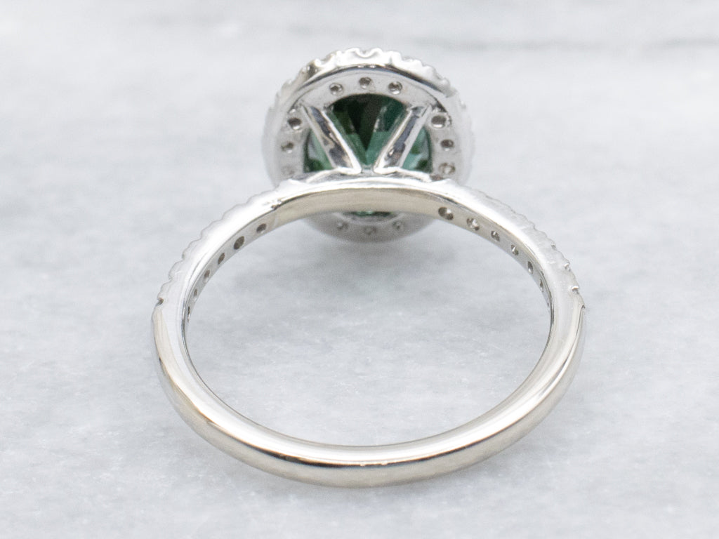 Modern Green Tourmaline and Diamond Halo White Gold Ring